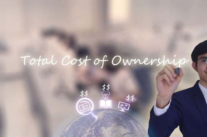 Tailored Solutions to Reduce Your Total Cost of Ownership man writing total cost of ownership on the image